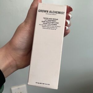 grown alchemist tinted age-repair lip treatment